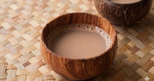 kava drink in wooden bowl traditional preparation on woven mat